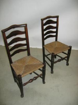 Appraisal: A SET OF THREE ASH SIDE CHAIRS of ladderback form