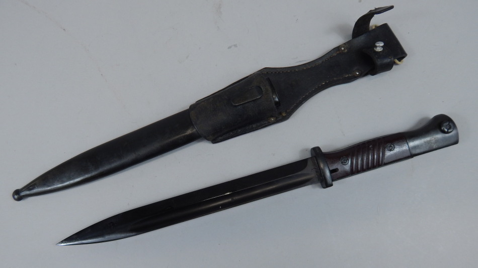 Appraisal: A late thC bayonet with blackened steel blade numbered and