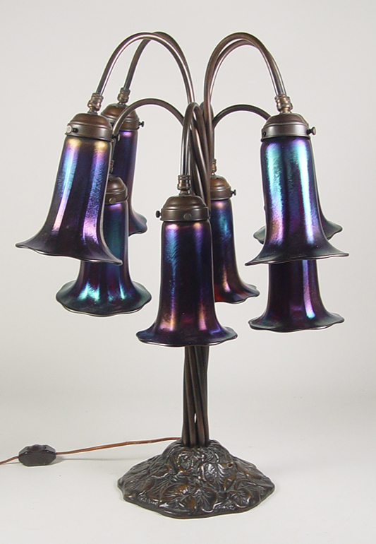 Appraisal: Tiffany Style Bronze Table Lamp th Century Bronze eight-lamp cluster