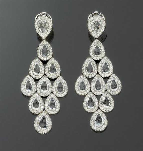 Appraisal: SAPPHIRE AND BRILLIANT-CUT DIAMOND PENDANT EARRINGS White gold Decorative lozenge-shaped