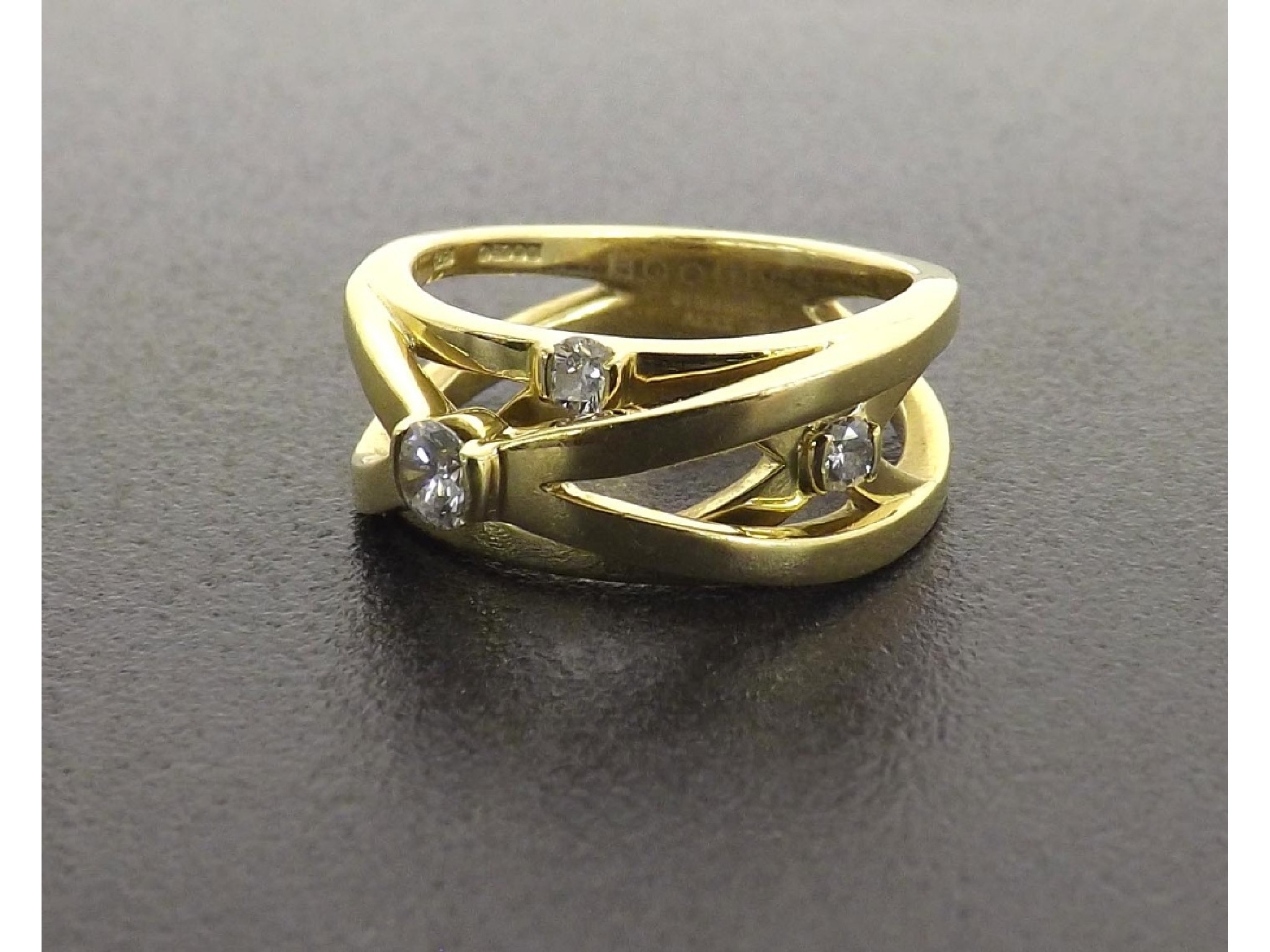 Appraisal: Boodles Dunthorne Labyrinth ct yellow gold diamond ring tension set