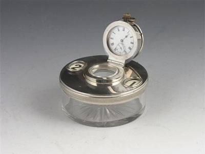 Appraisal: An early th century chrome and glass inkwell watch stand