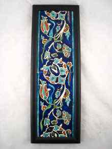 Appraisal: A panel of two Iznik tiles x cm