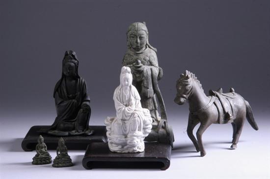 Appraisal: CHINESE BRONZE FIGURE AND BLANC-DE-CHINE PORCELAIN FIGURE OF GUANYIN Together