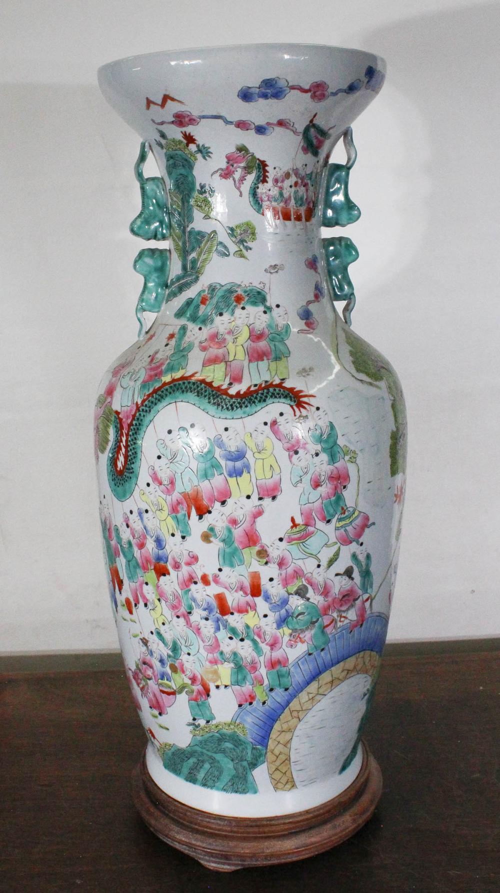 Appraisal: CHINESE PORCELAIN VASE hand painted featuring figures celebrating with a