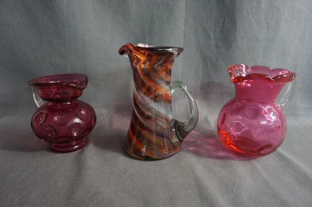 Appraisal: Includes cranberry ruffle edge pitcher with applied clear handle cranberry