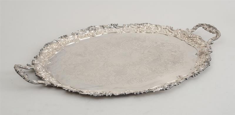 Appraisal: GEORGE III STYLE SILVER-PLATED TWO-HANDLED TRAY Stamped 'Mounts stamped from