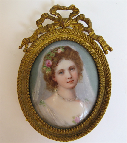 Appraisal: GERMAN OVAL MINIATURE PORTRAIT OIL ON PORCELAIN of a young