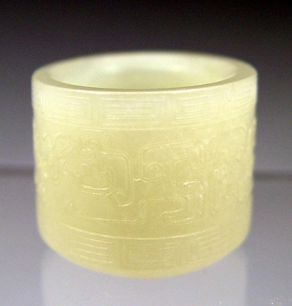 Appraisal: CHINESE WHITE JADE ARCHERS RING With engraved decoration '' dia