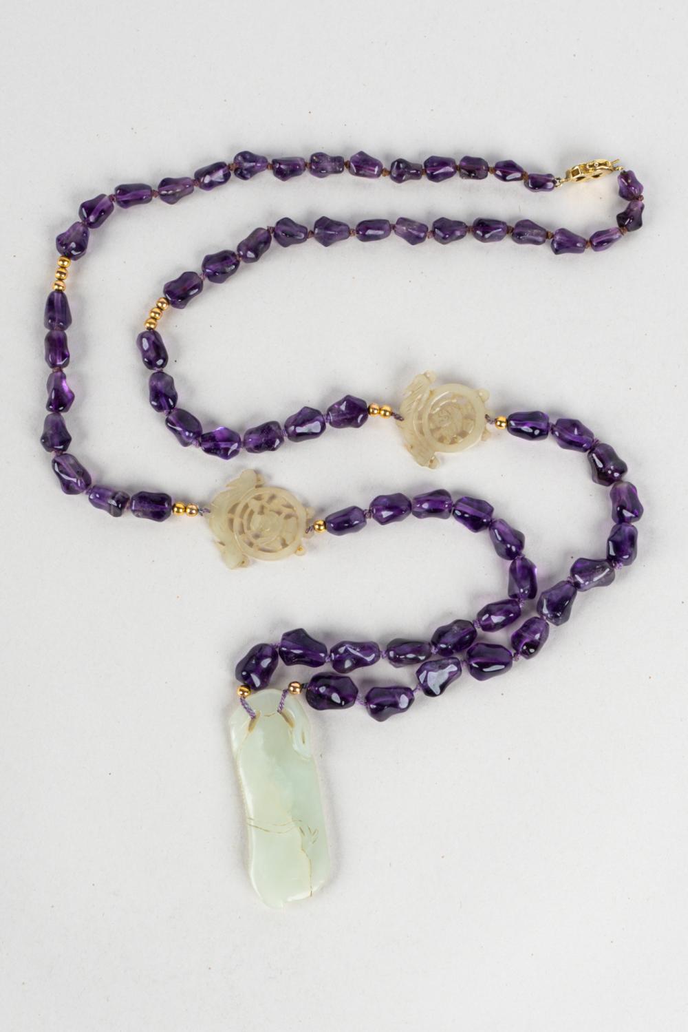 Appraisal: KARAT YELLOW GOLD BOWENITE AMETHYST NECKLACEcontaining baroque shape drilled natural