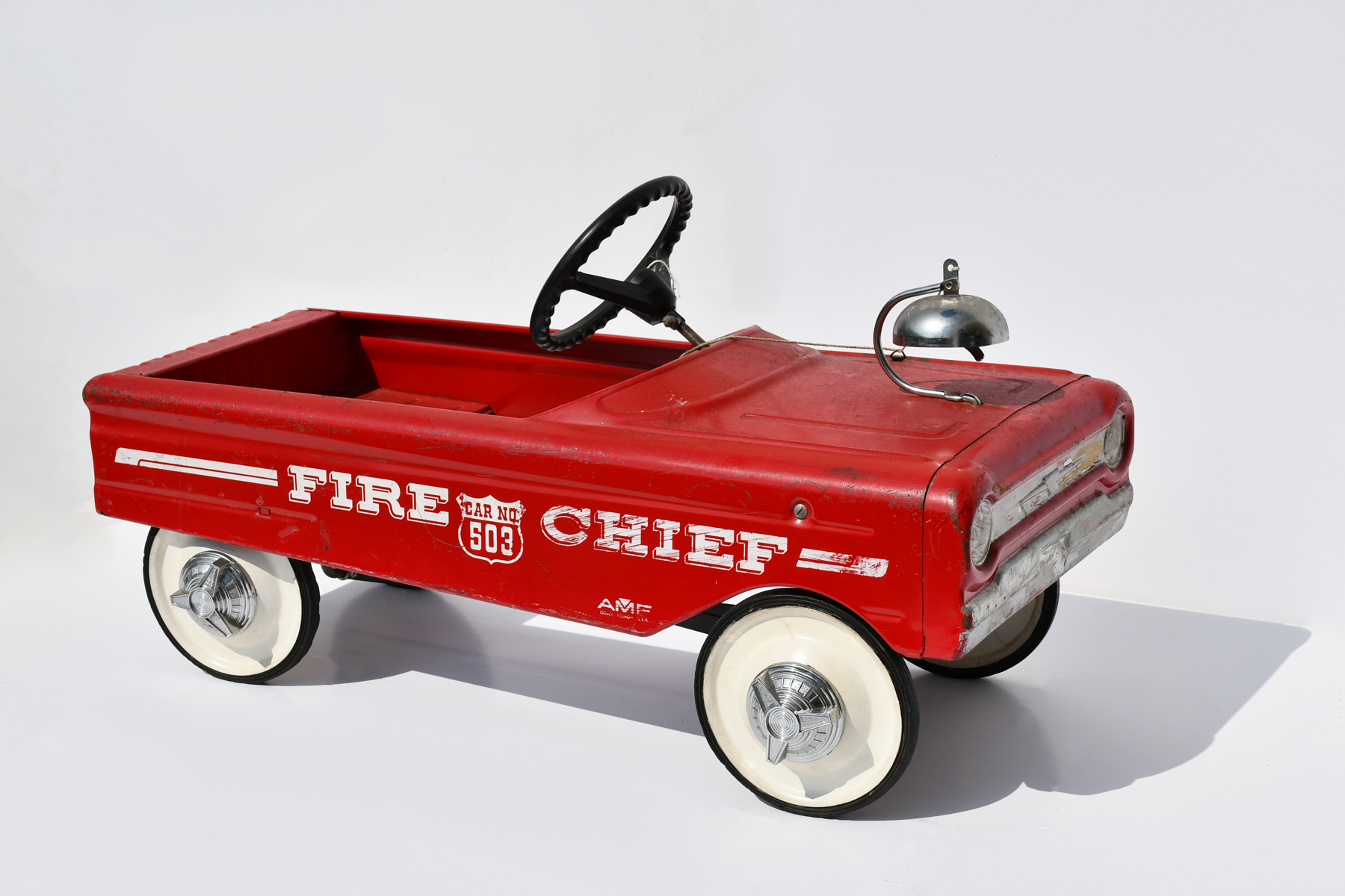 Appraisal: AMF FIRE CHIEF CAR NO PEDAL CAR Vintage AMF Fire