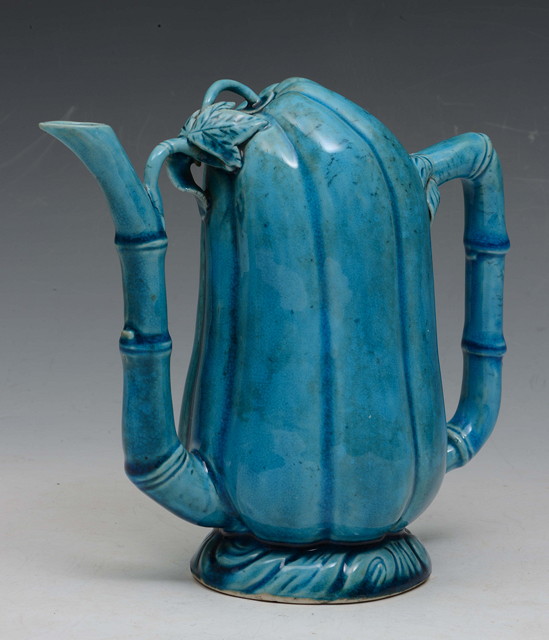 Appraisal: A CHINESE TURQUOISE PORCELAIN CADOGAN TEAPOT in the form of