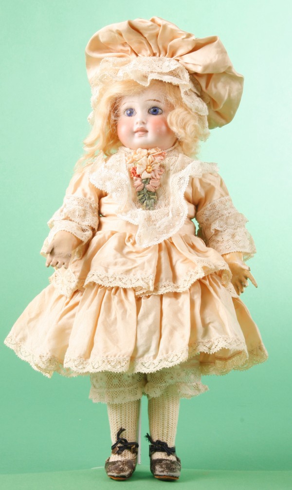 Appraisal: Cabinet size Belton doll with a French style face This