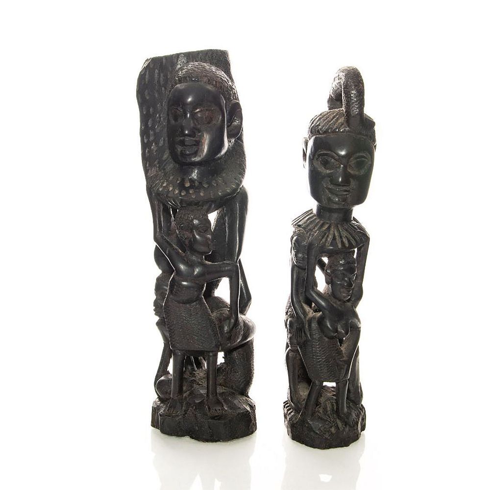 Appraisal: PAIR OF MAKONDE STYLE WOOD CARVINGS MALE AND FEMALE Family