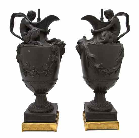 Appraisal: A Pair of Wedgwood Basalt Ewers emblematic of water and