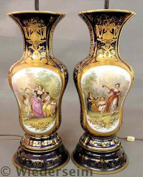 Appraisal: Magnificent pair of French porcelain vases converted to electric lamps