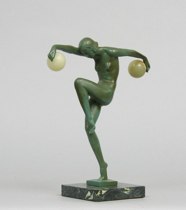 Appraisal: Art Deco Dancing Figurine with two Balls ca mid th