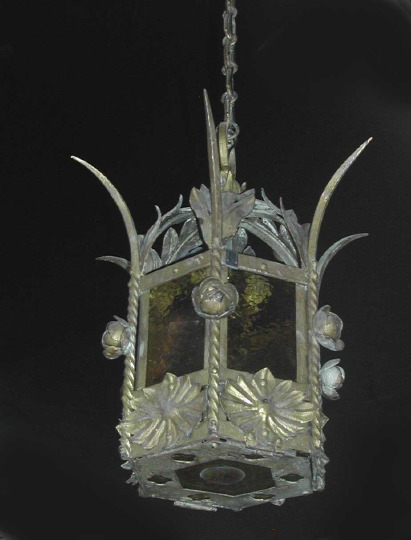 Appraisal: Attractive German Gilded Wrought- and Cut-Iron and Pebbled Amber Glass