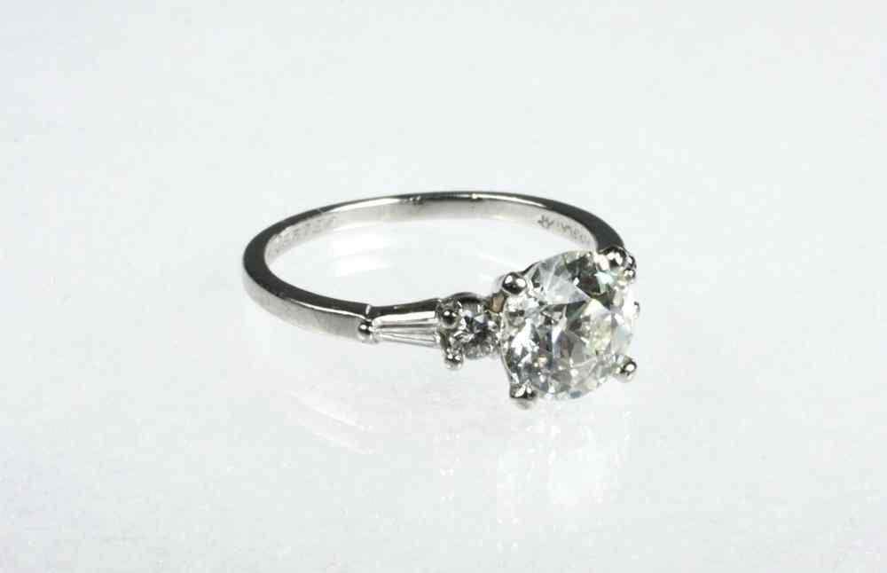 Appraisal: LADY'S RING - Platinum and diamond ring composed of a