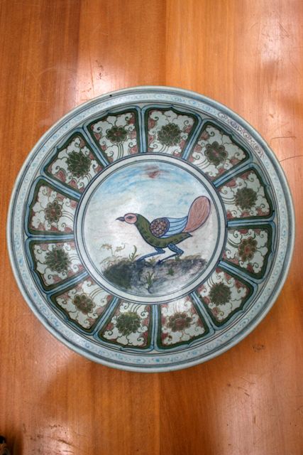 Appraisal: A Chinese th century dish featuring a peacock cm diameter