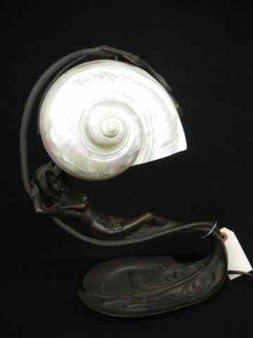 Appraisal: Figural Bronze Lamp of Nude at Rest natulus shell shade