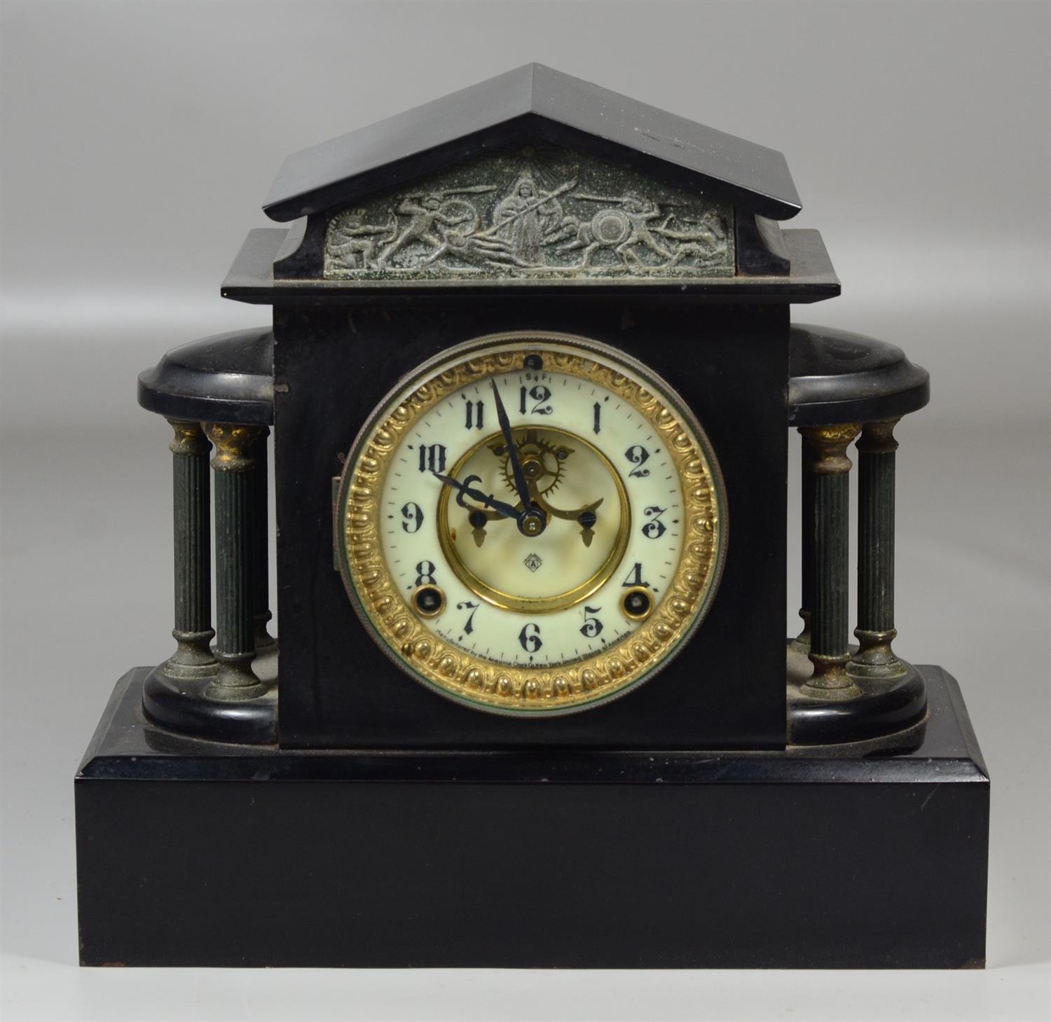 Appraisal: Ansonia black slate brass tone mantle clock with Classical frieze