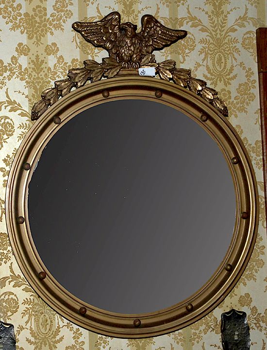 Appraisal: Federal Style Eagle Mirror A carved wood concave eagle mirror