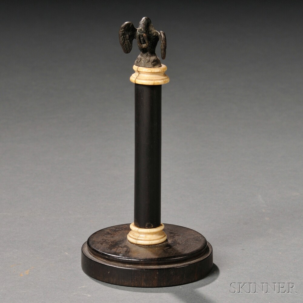 Appraisal: Copper Bone and Ebony Watch Holder with Eagle Finial America