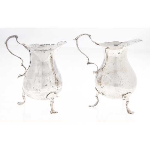 Appraisal: Two similar Victorian silver cream jugs in English mid th