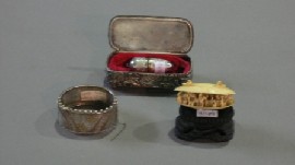 Appraisal: A Victorian silver cuff casket for bobby pins and miniature