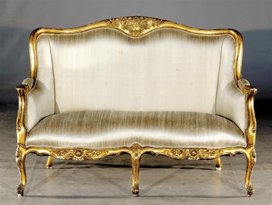 Appraisal: Continental carved giltwood and upholstered settee late th centurybead-and-channel frame