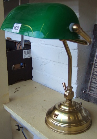 Appraisal: A brass desk lamp with green glass shade