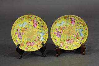 Appraisal: Two Chinese Enamel Yellow Dishes Pair of Chinese enamel porcelain