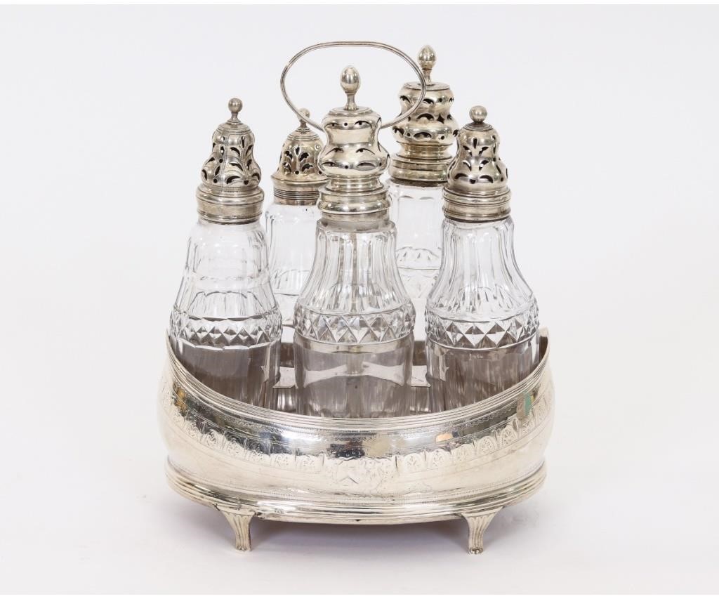 Appraisal: English silver cruet set with five bottles of various makers