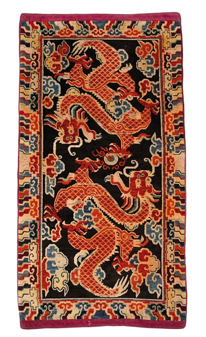 Appraisal: Tibetan rug late th century Of rectangular form depicting two