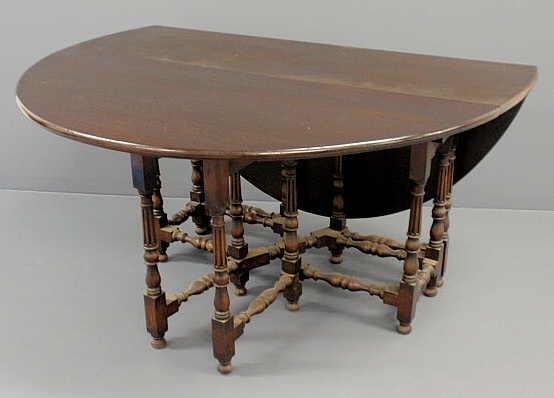 Appraisal: Jacobean style oak gate-leg table h top w x l