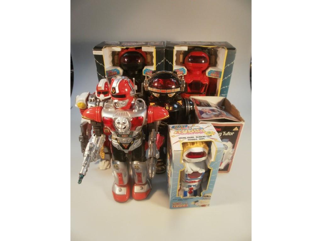 Appraisal: Seven battery operated robots including a boxed talking tutor robot