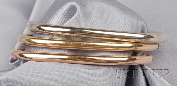 Appraisal: Set of Three kt Tricolor Gold Bangles each hinged shaped