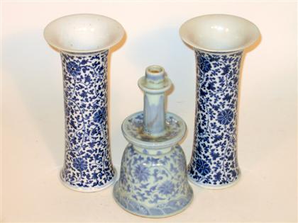 Appraisal: Pair of Chinese blue and white beaker vases and pricket