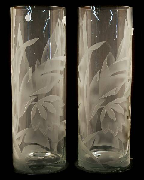 Appraisal: A pair of tall etched and clear glass cylindrical vases