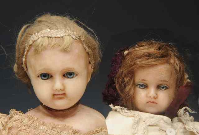 Appraisal: A VICTORIAN WAX HEAD CHILD'S DOLL and another