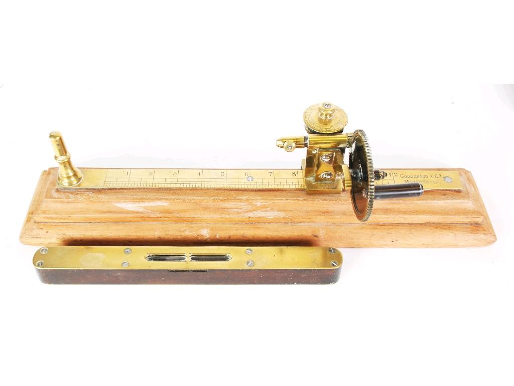 Appraisal: A GOODBRAND AND CO MANCHESTER BRASS YARN MEASURE on wooden