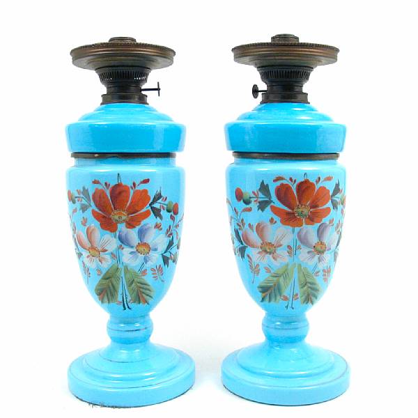 Appraisal: A pair of paint decorated blue glass oil lamps height