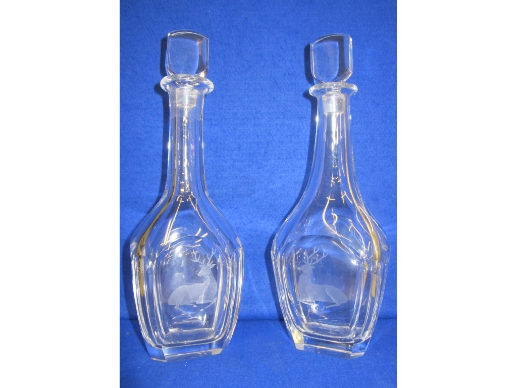 Appraisal: A matching pair of Orrefors hand blown crystal decanters each