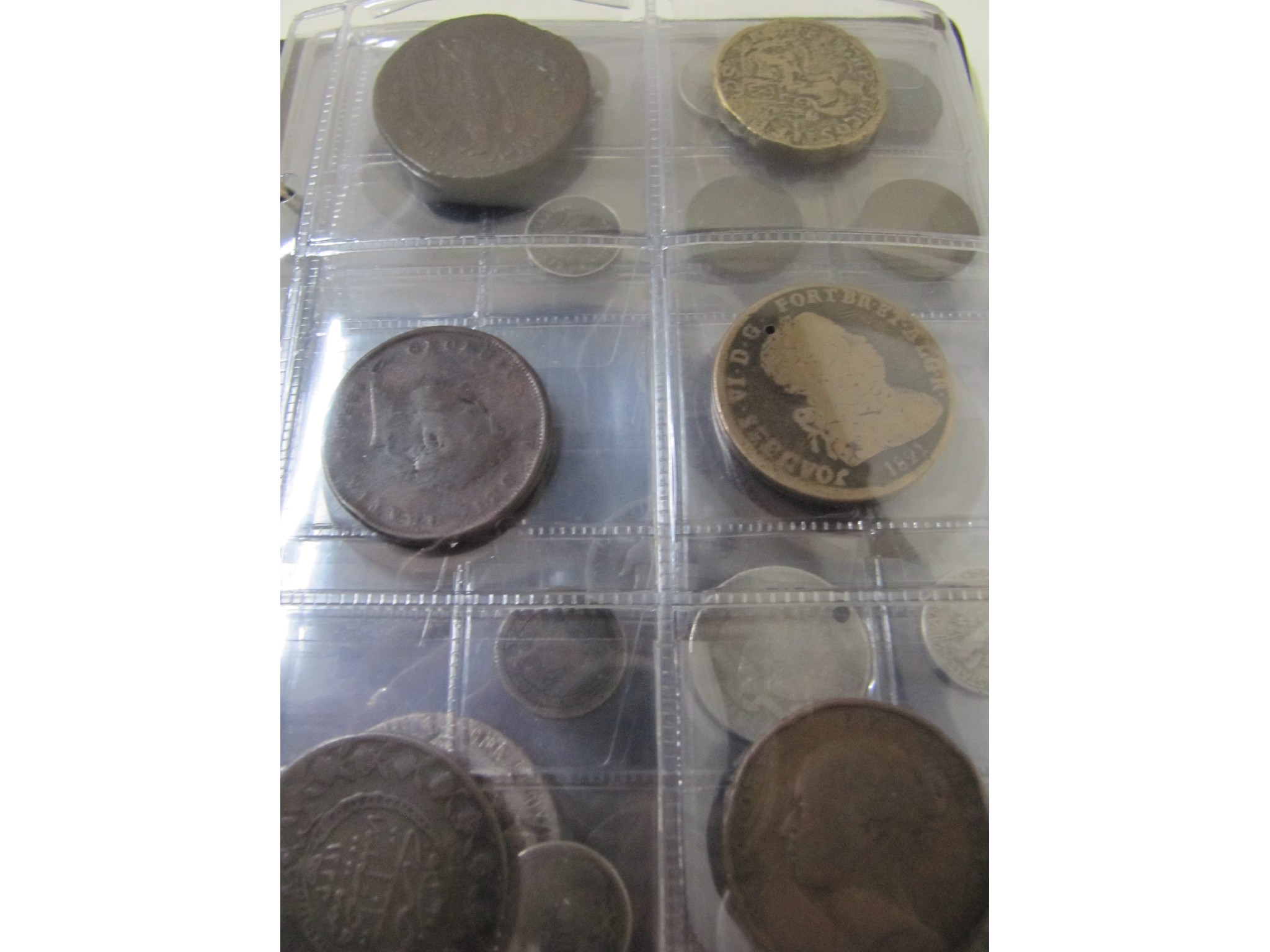 Appraisal: An album of coins to include a Greek coin of