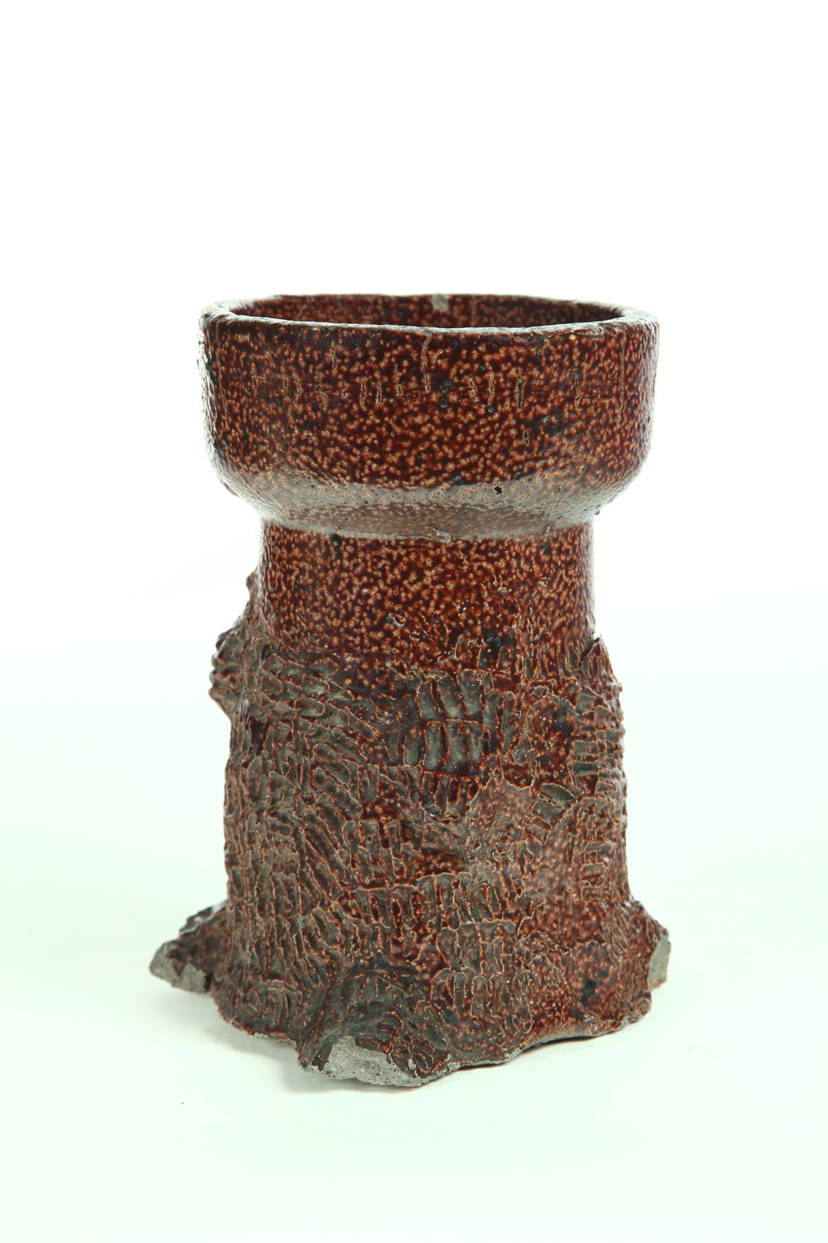 Appraisal: SEWERTILE PLANTER Ohio early th century Tree trunk with hand