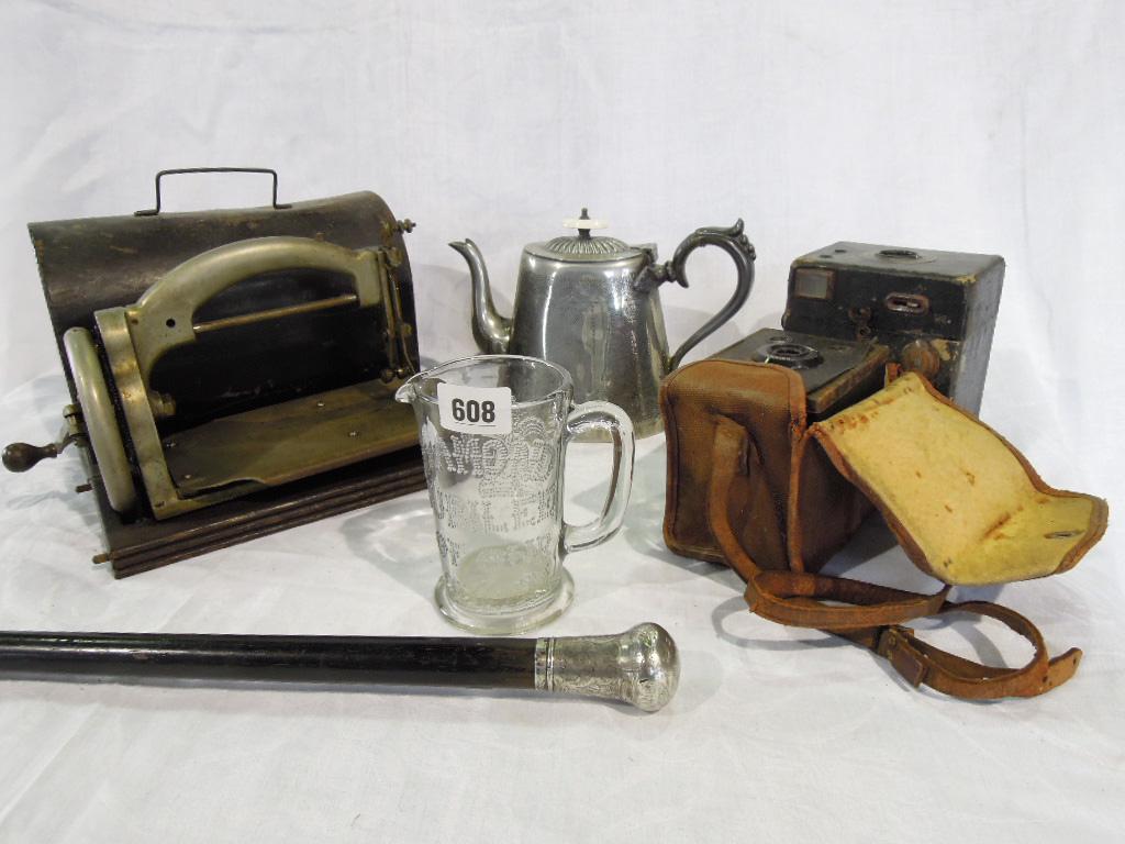 Appraisal: A miscellaneous collection of items including a small sewing machine