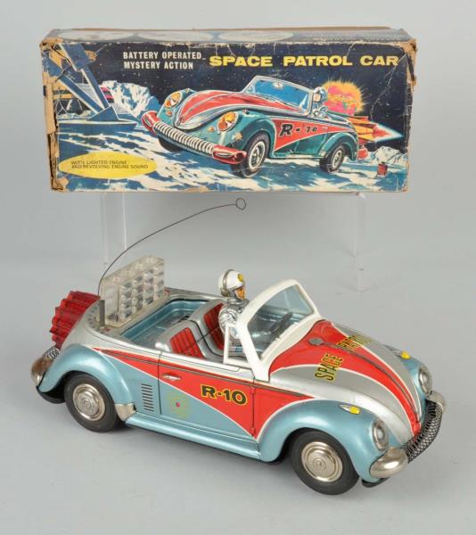 Appraisal: Japanese Tin Litho Battery-Operated Space Patrol Car is a Volkswagen