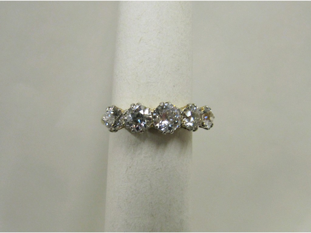 Appraisal: Eighteen carat gold diamond five stone ring with rose cut