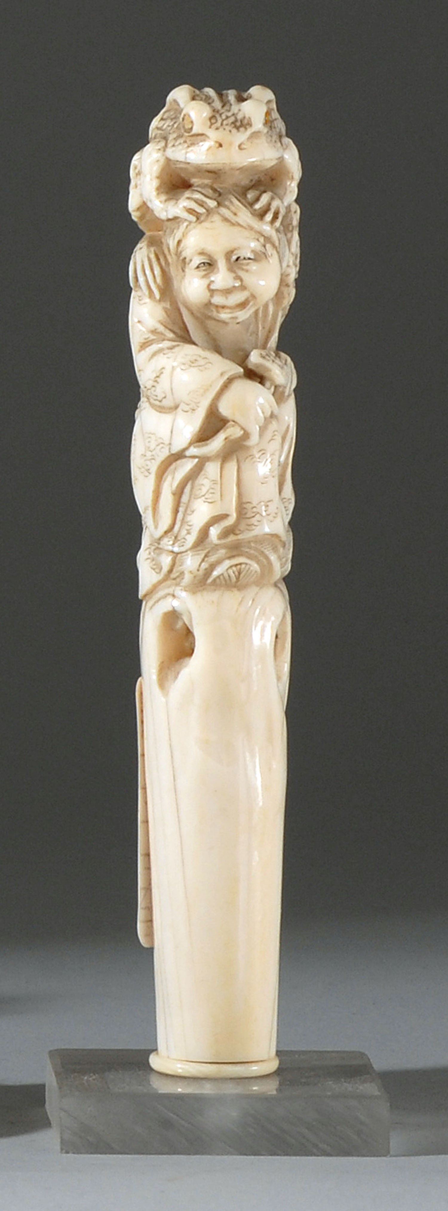 Appraisal: IVORY PARASOL HANDLE th CenturyDepicting Gama Sennin and a frog